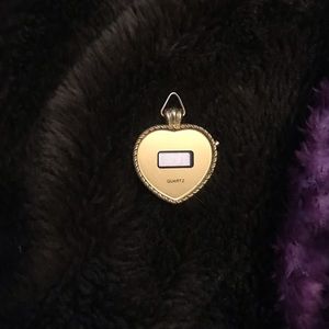 gold heart shaped watch pendant